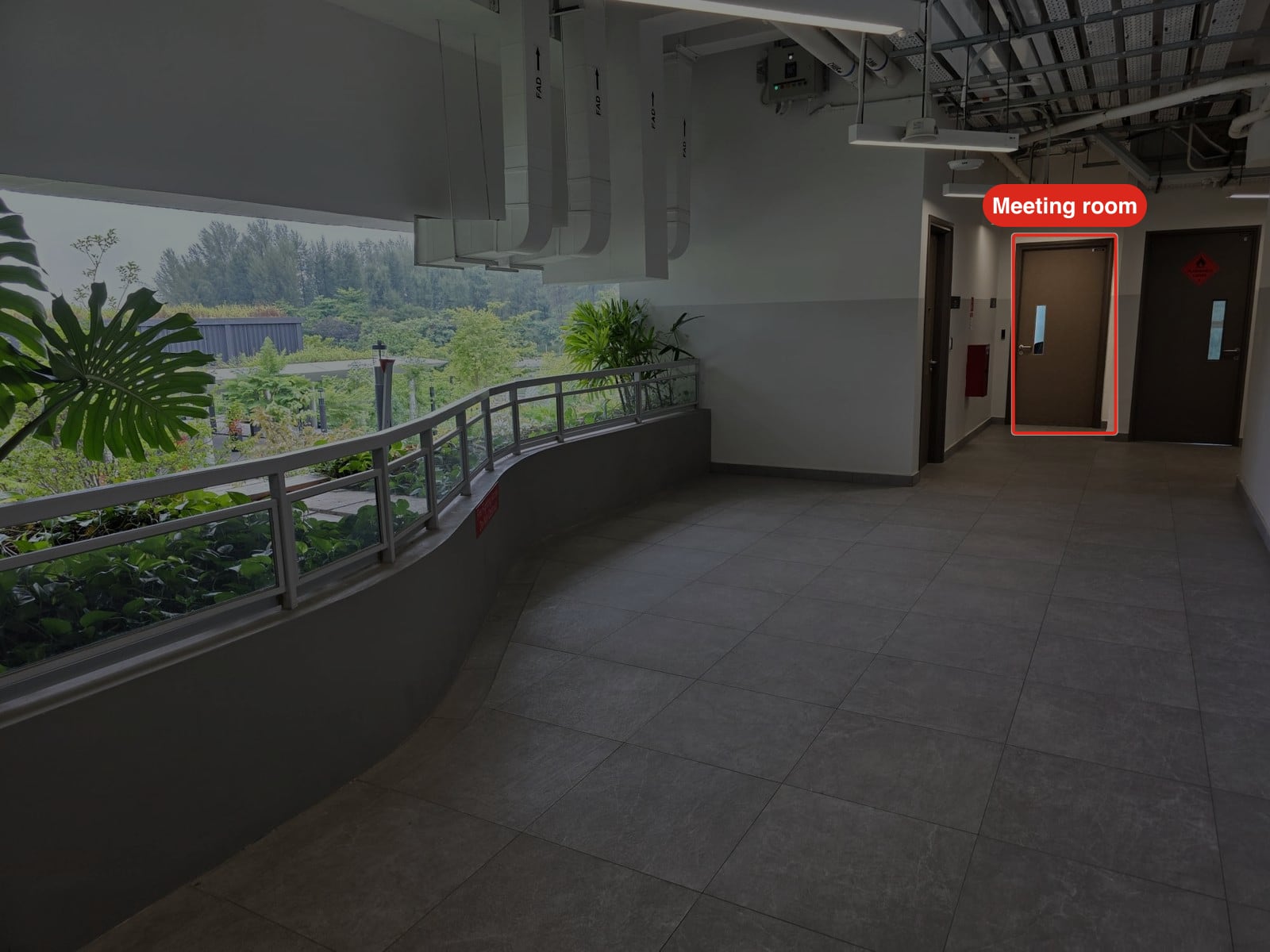 The highlighted door is ours. The red-diamond door beside it is a store.